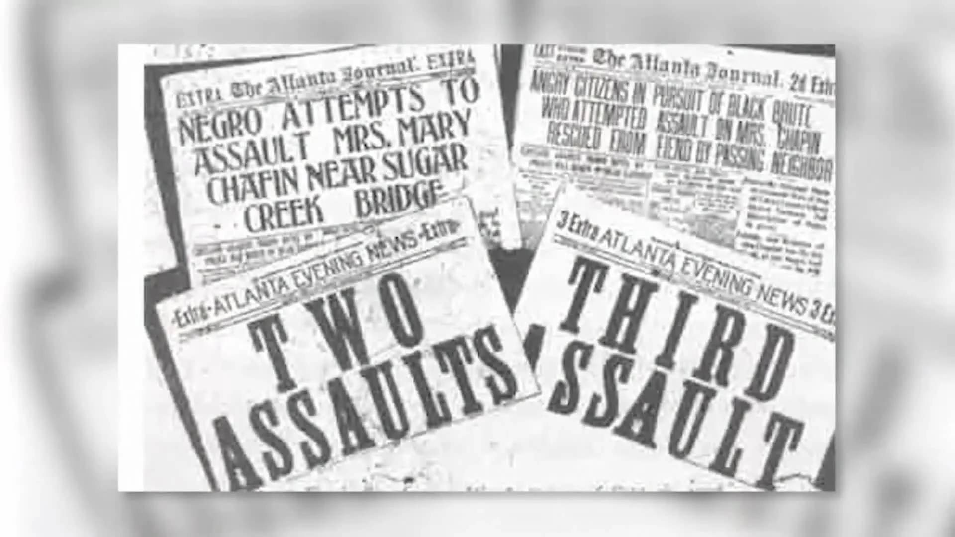 Front pages of the Atlanta Journal and Atlanta Evening News extras of September 22, 1906, headlined TWO ASSAULTS and THIRD ASSAULT.